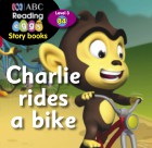 Charlie rides a bike